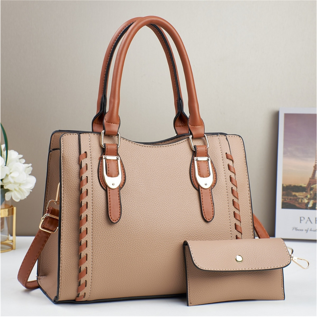 Bolsa feminina prática de grande capacidade com alcas destacaveis e ajustaveis incluindo uma carteira de fecho de botao